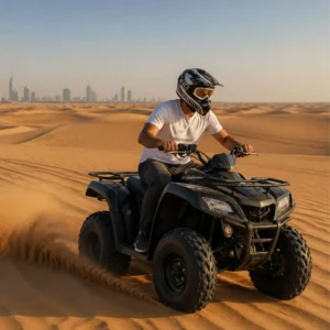 Quad Biking Through the Sands of Riyadh: Rider enjoying the thrill of quad biking across the vast desert dunes of Riyadh.