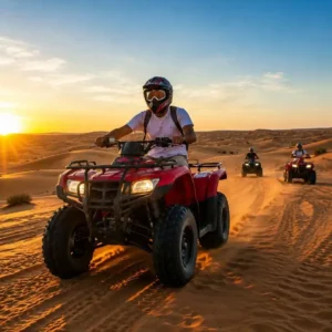 Is Quad Biking Riyadh Across Golden Dunes – tourists riding ATVs over golden desert dunes under natural sunlight for an adventurous desert experience